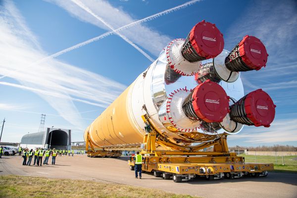 The Space Launch System's first core stage booster is transported to the Pegasus barge for delivery to NASA's Stennis Space Center in Mississippi from the Michoud Assembly Facility in Louisiana...on January 8, 2020.
