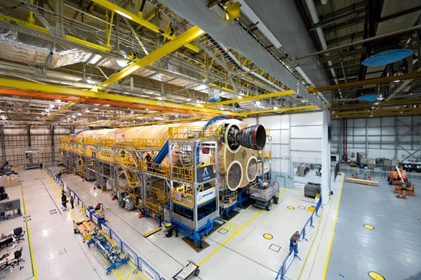 At NASA's Michoud Assembly Facility in New Orleans, Louisiana, the first of four RS-25 engines is attached to the Space Launch System core stage booster that will fly on the Artemis I mission.