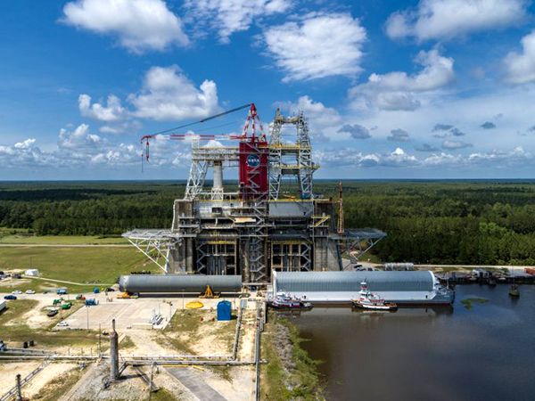 An aerial view of the Space Launch System's (SLS) core stage pathfinder article near the base of the B-2 Test Stand at NASA's Stennis Space Center in Mississippi.