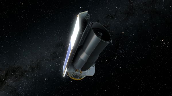 An artist's concept of NASA's Spitzer Space Telescope gazing at the heavens while floating through deep space.