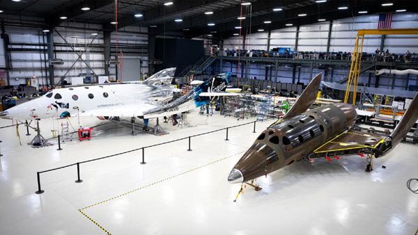 A snapshot of VSS Unity next to the second ship, which now sits on its own landing gear, in the Virgin Galactic fleet.