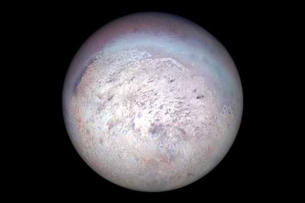 An image of Neptune's moon Triton that was taken by NASA's Voyager 2 spacecraft in August of 1989.