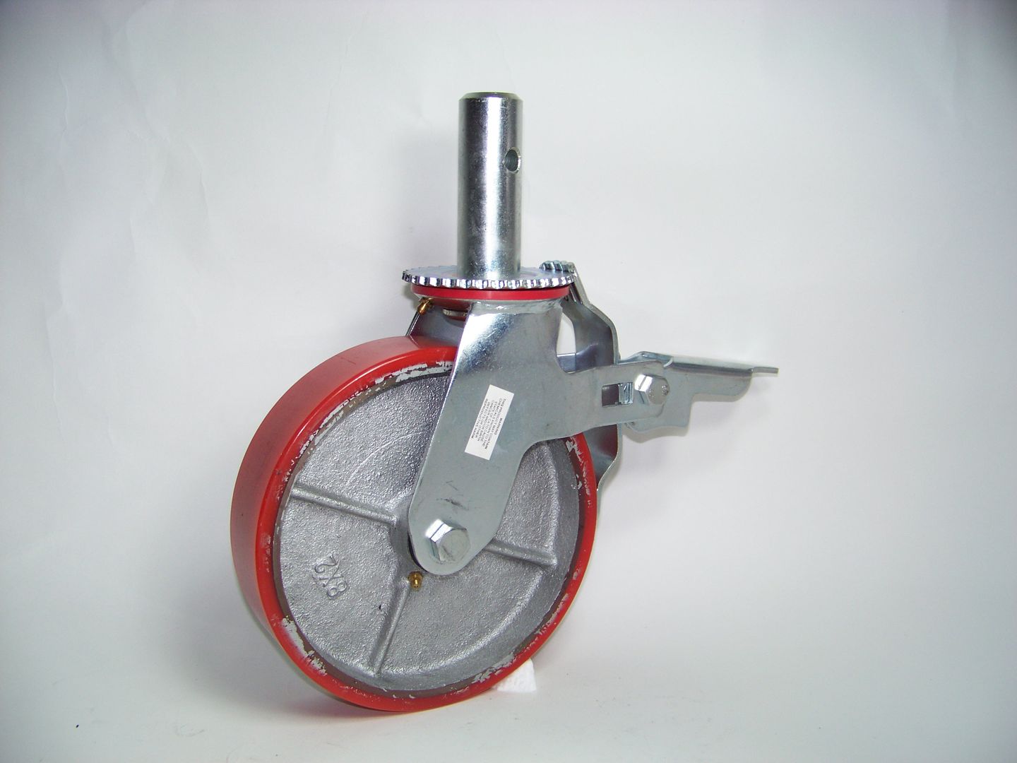   wheel locking mechanism simultaneously locks swivel and wheel solid
