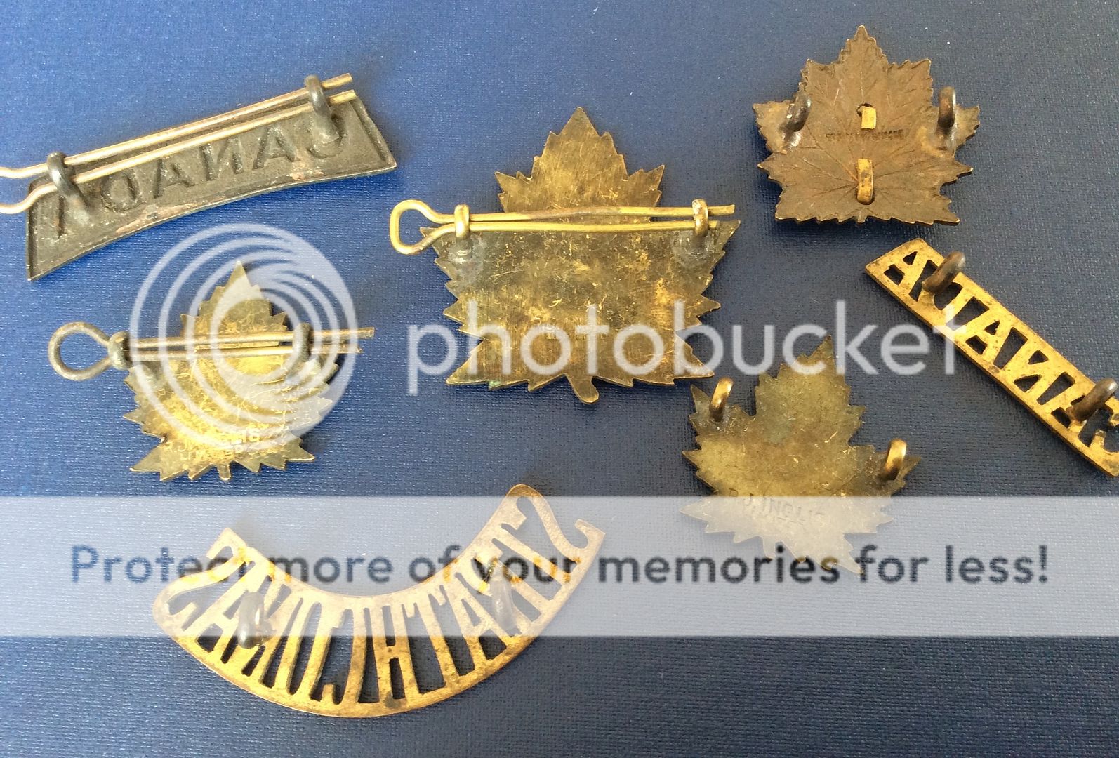 A few medals and a couple of badges... 709AB09F-E475-4EF4-9D9E-7136CD67F24A_zps9kqljwkt