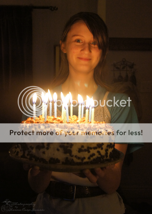 Munchkin holding her birthday cake