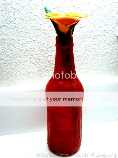 Red Vase with Clay Rose