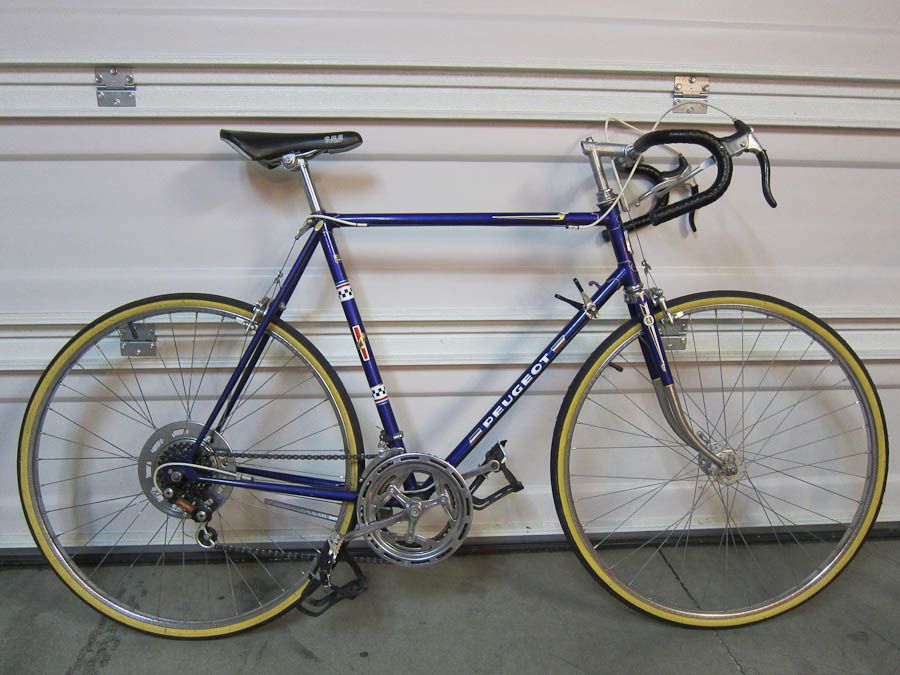 yellow peugeot road bike