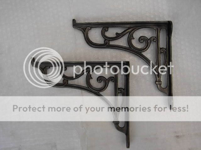   original antique cast iron brackets for your cistern or shelf