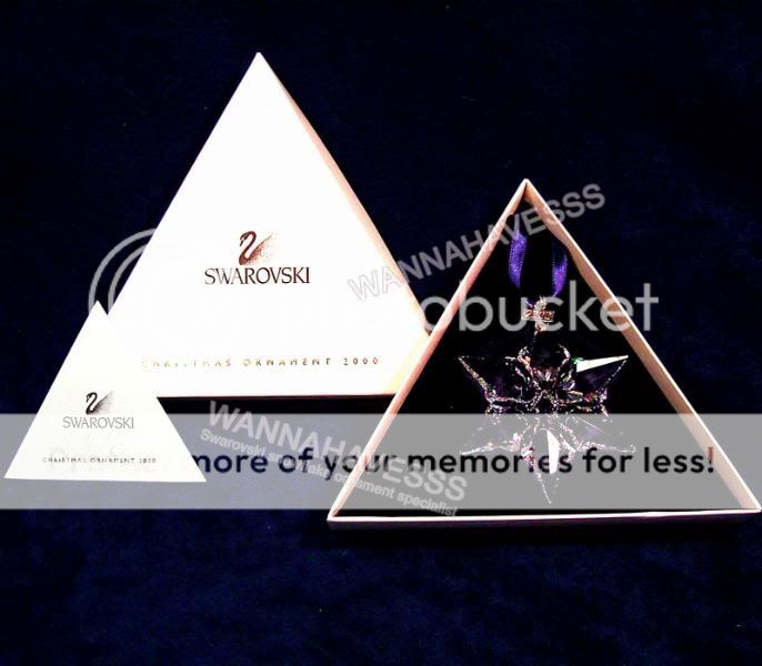 bidding for the rare retired SWAROVSKI 2000 annual snowflake ornament 