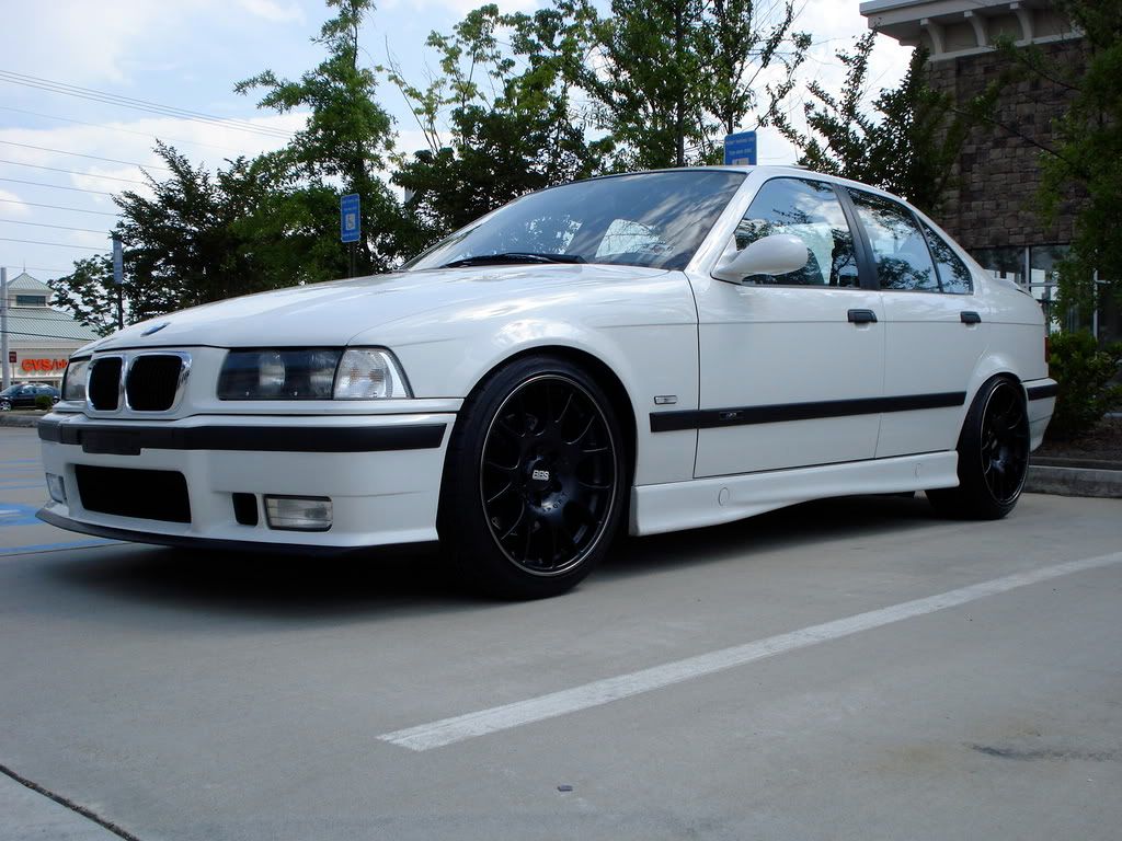 Pics of E36 with rolled/pulled fenders