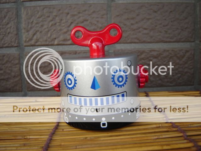 This is Time Gear Silver Robot 60 minutes kitchen timer. The bottom is 