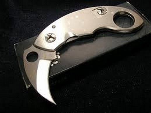 DANGEROUS CURVES: THE KARAMBIT Spyderco%20Kerambit_zpsnqdzxt4s