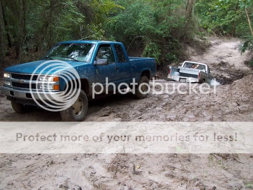 Chevy pulling ford out of mud #10